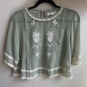 Sheer Sea foam green top w/ lace details. Hardly worn. From Urban Outfitters